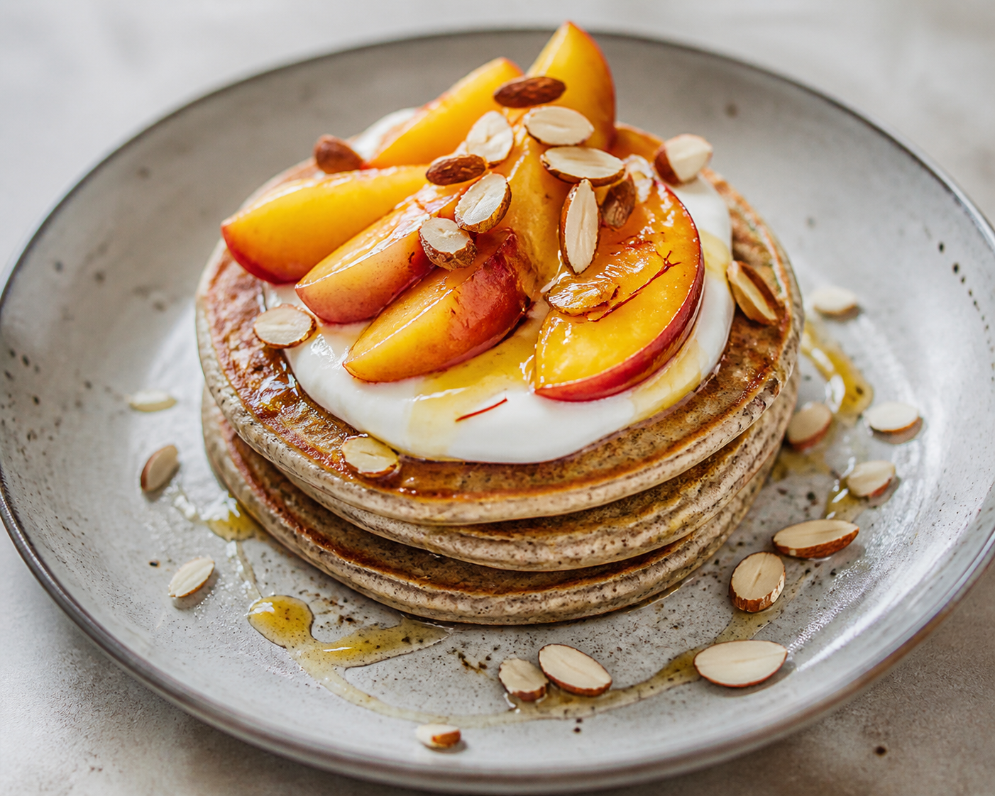 Buckwheat Yogurt Pancakes with Saffron Nectarines and Toasted Almonds