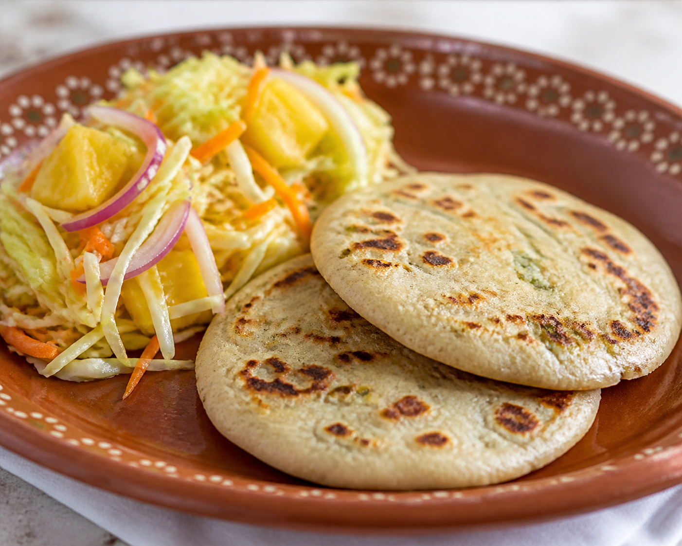 Pupusas de Loroco y Frijol con Curtido de Piña Asada