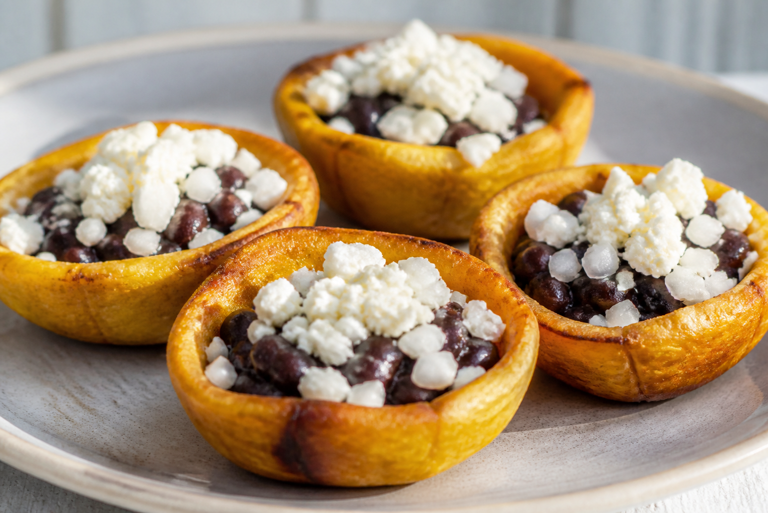 Criollo Plantain Cups with Black Beans and Llanero Cheese