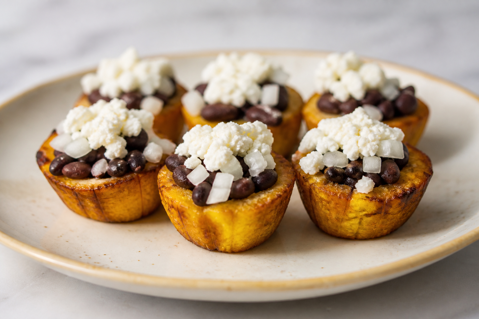 Plantain Criollo Cups with Black Beans and Queso de Mano