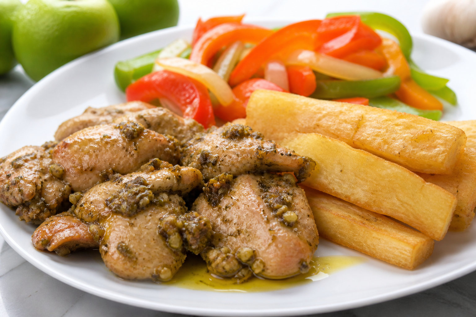 Dominican Sour Orange Garlic Chicken with Crispy Yuca and Peppers