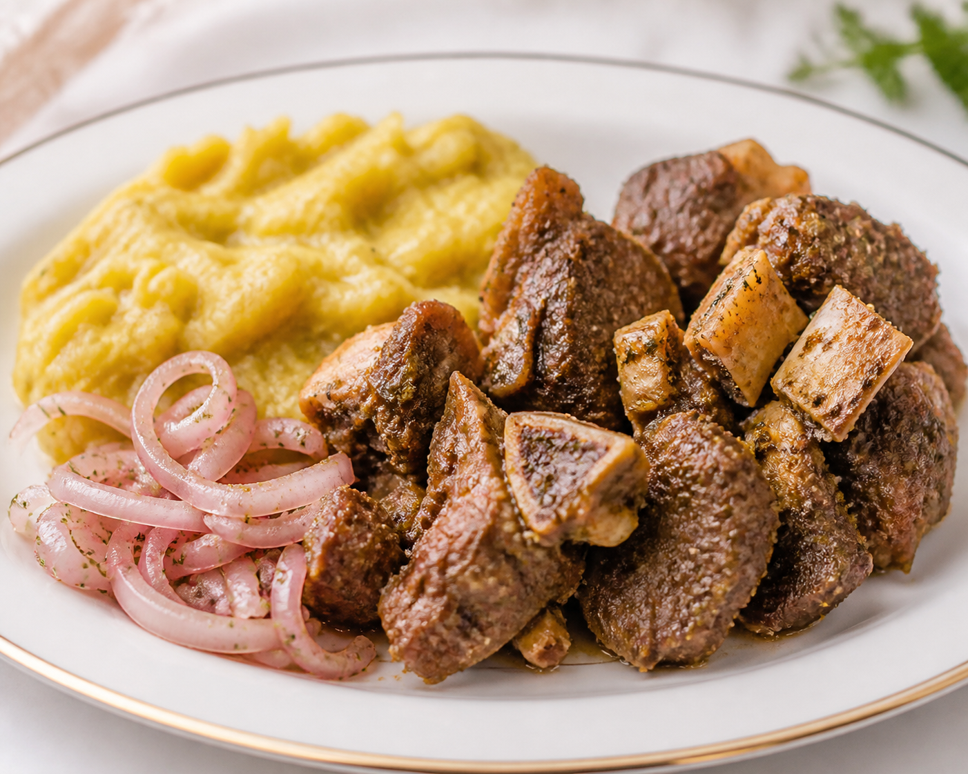 Dominican Gentle Cocoa Goat with Smoky Mangu and Oregano Onions