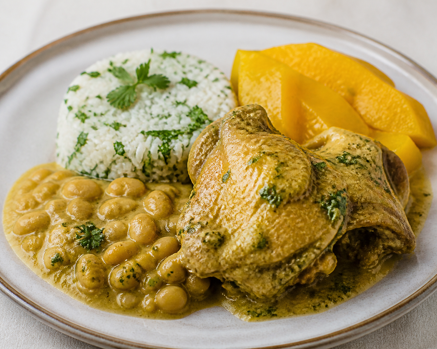 Creamy Peruvian Chicken Seco with Canary Beans, Zapallo Loche and Cilantro Rice