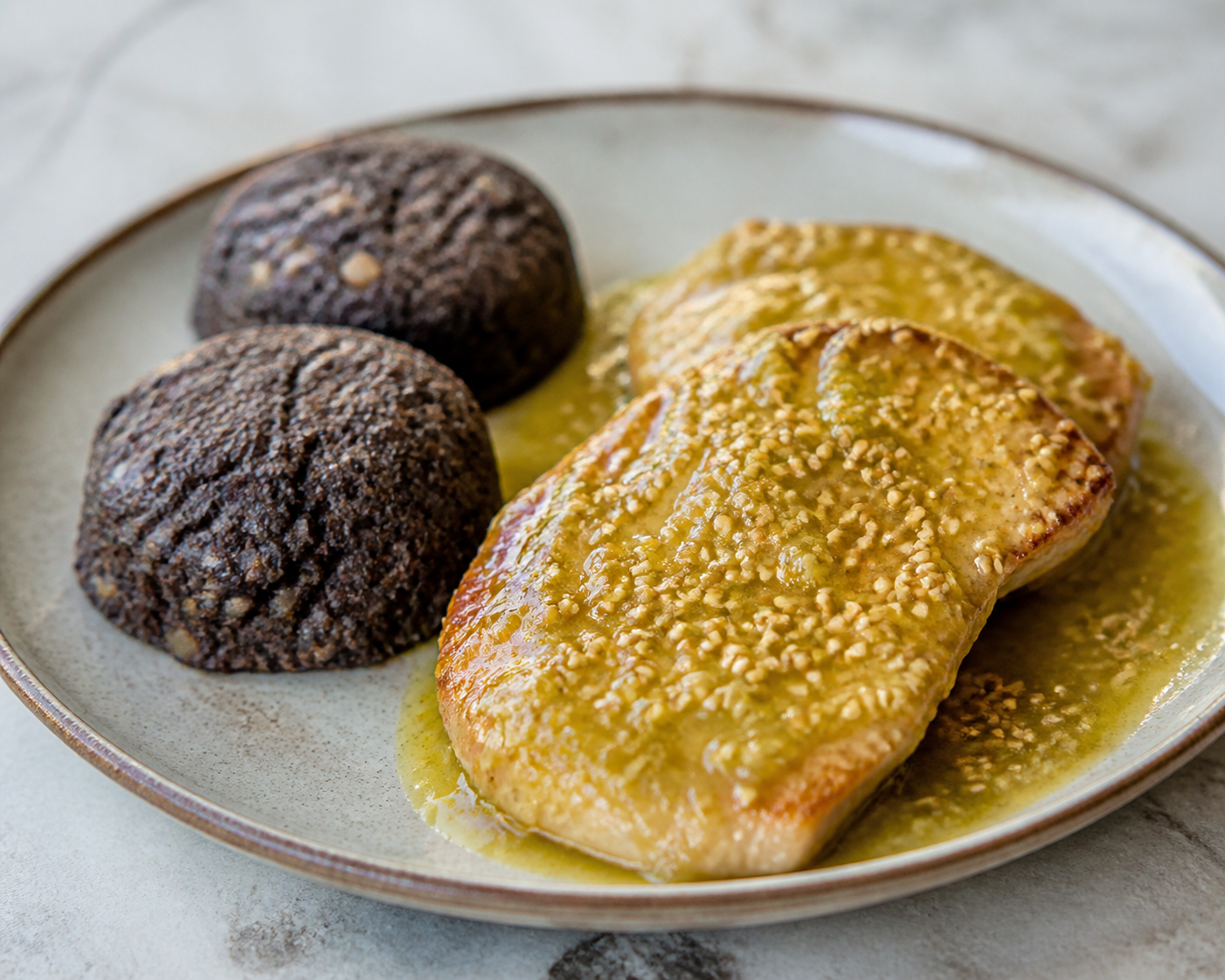 Honduran Pork Chops in Green Mango Sesame Sauce with Black Bean Cakes