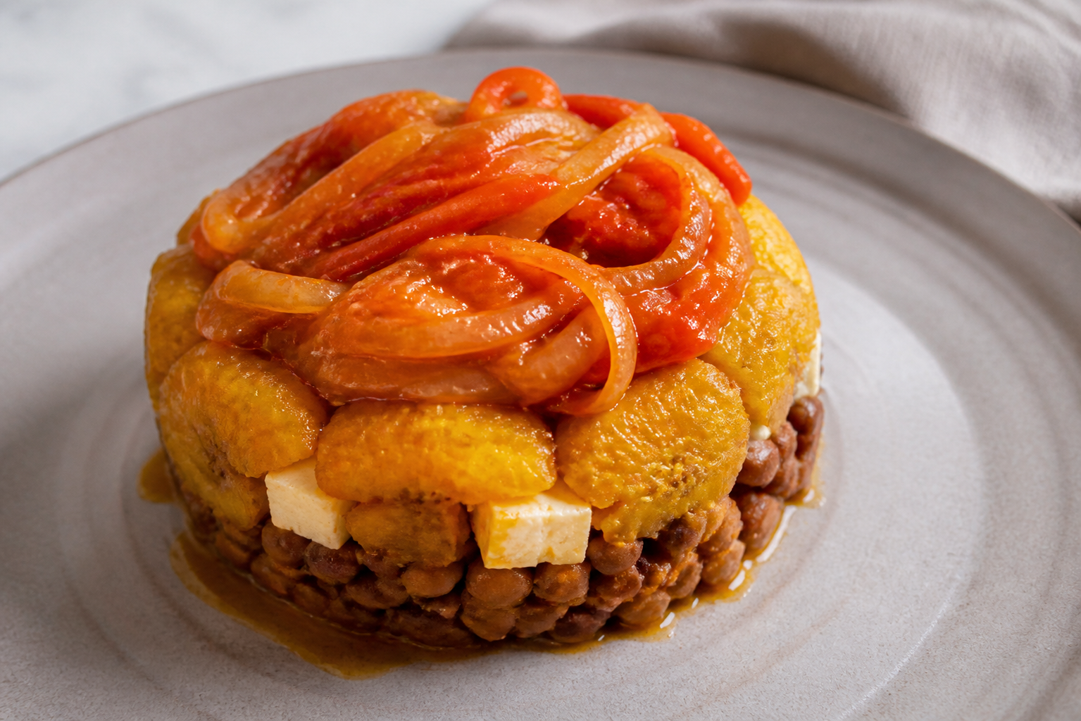 Llanero Pigeon Pea, Sweet Plantain and White Cheese Timbale with Ají Dulce Stew