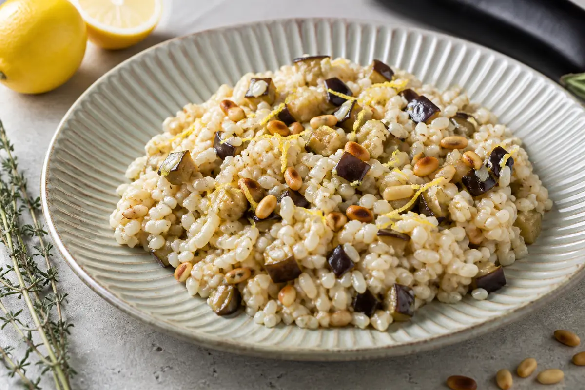 Creamy Smoked Eggplant Rice with Lemon and Pine Nuts