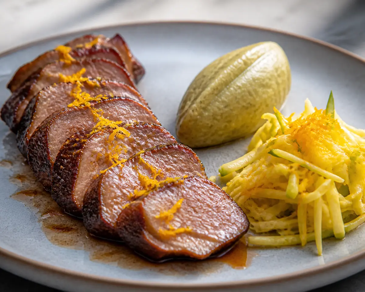 Caribbean Coffee-Orange Pork with Green Plantain Quenelle and Crunchy Pineapple Slaw