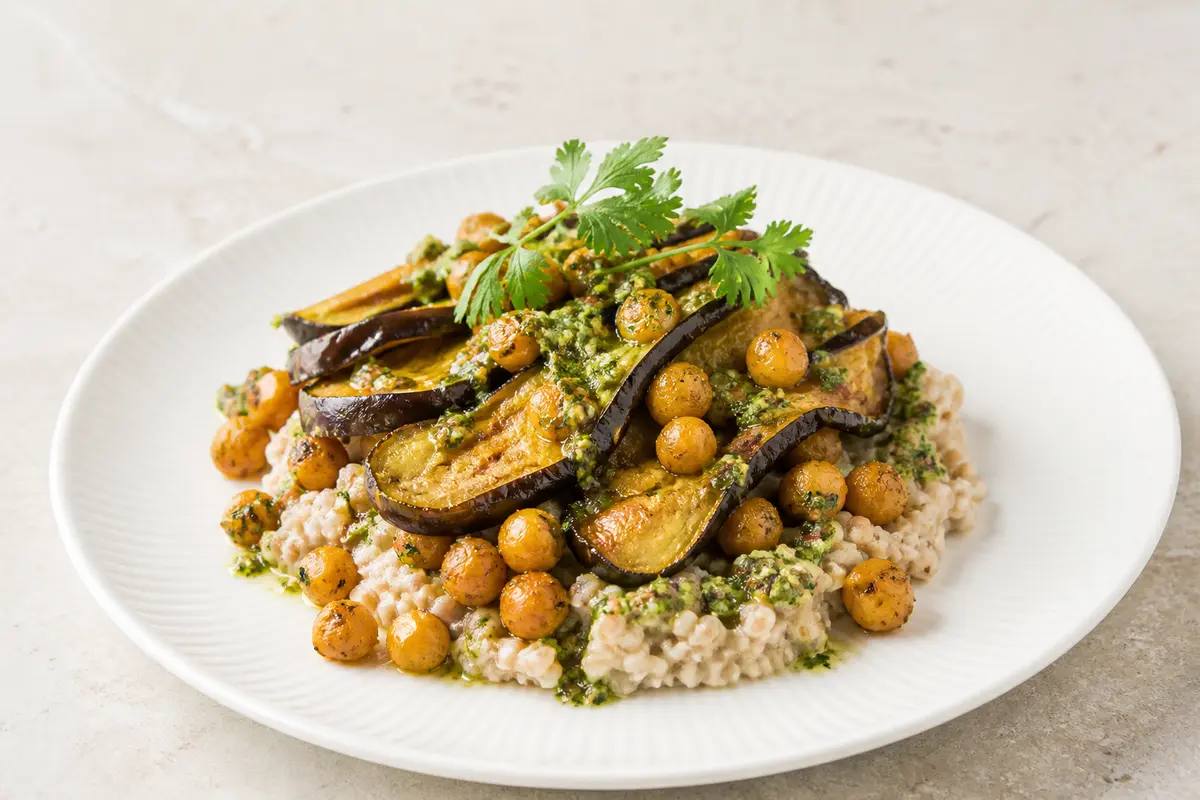 Golden Eggplant with Creamy Buckwheat, Spiced Chickpeas and Lemon Herb Sauce