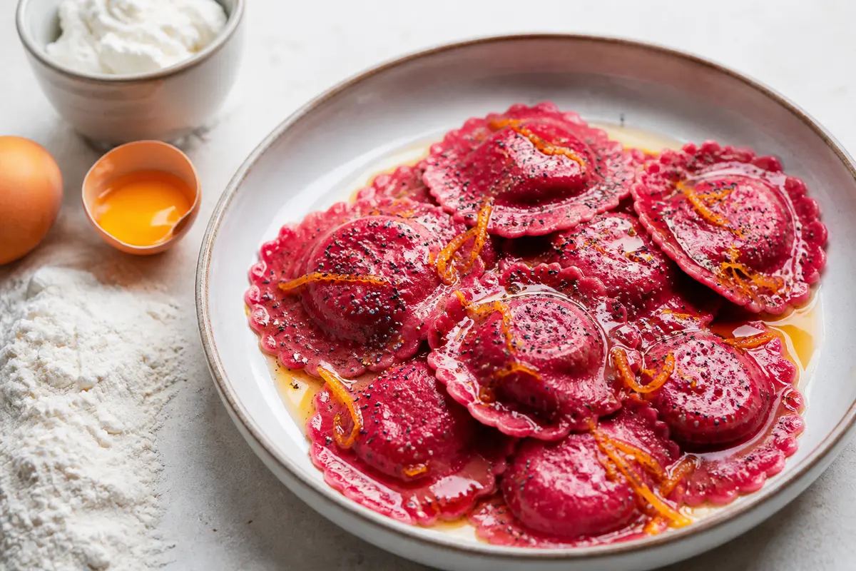 Girasoli de Remolacha y Ricotta con Mantequilla de Naranja y Semillas de Amapola