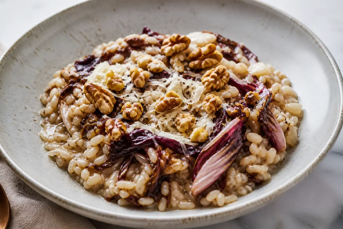 Creamy rice with roasted radicchio, pearled barley and provolone with toasted walnuts