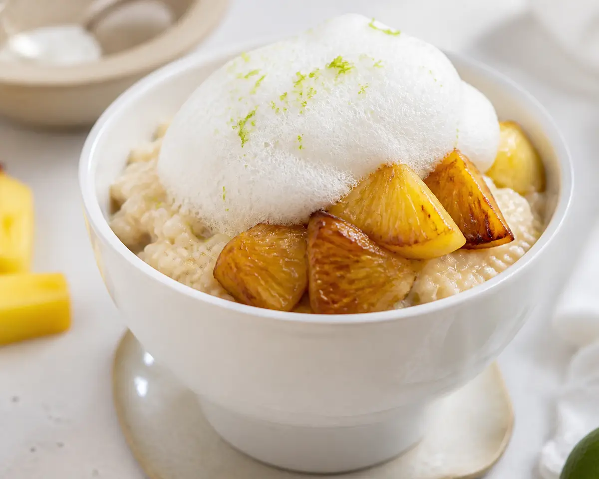Warm Creamy Millet Cup with Caramelized Pineapple and Coconut-Lime Cloud