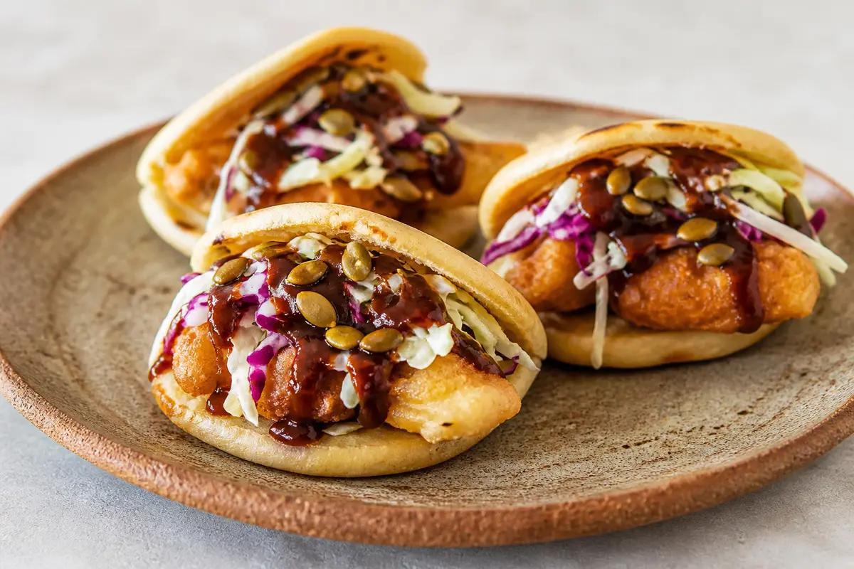 Fish Chicharrón Gorditas with Tamarind Adobo, Cabbage Slaw, and Toasted Pepitas