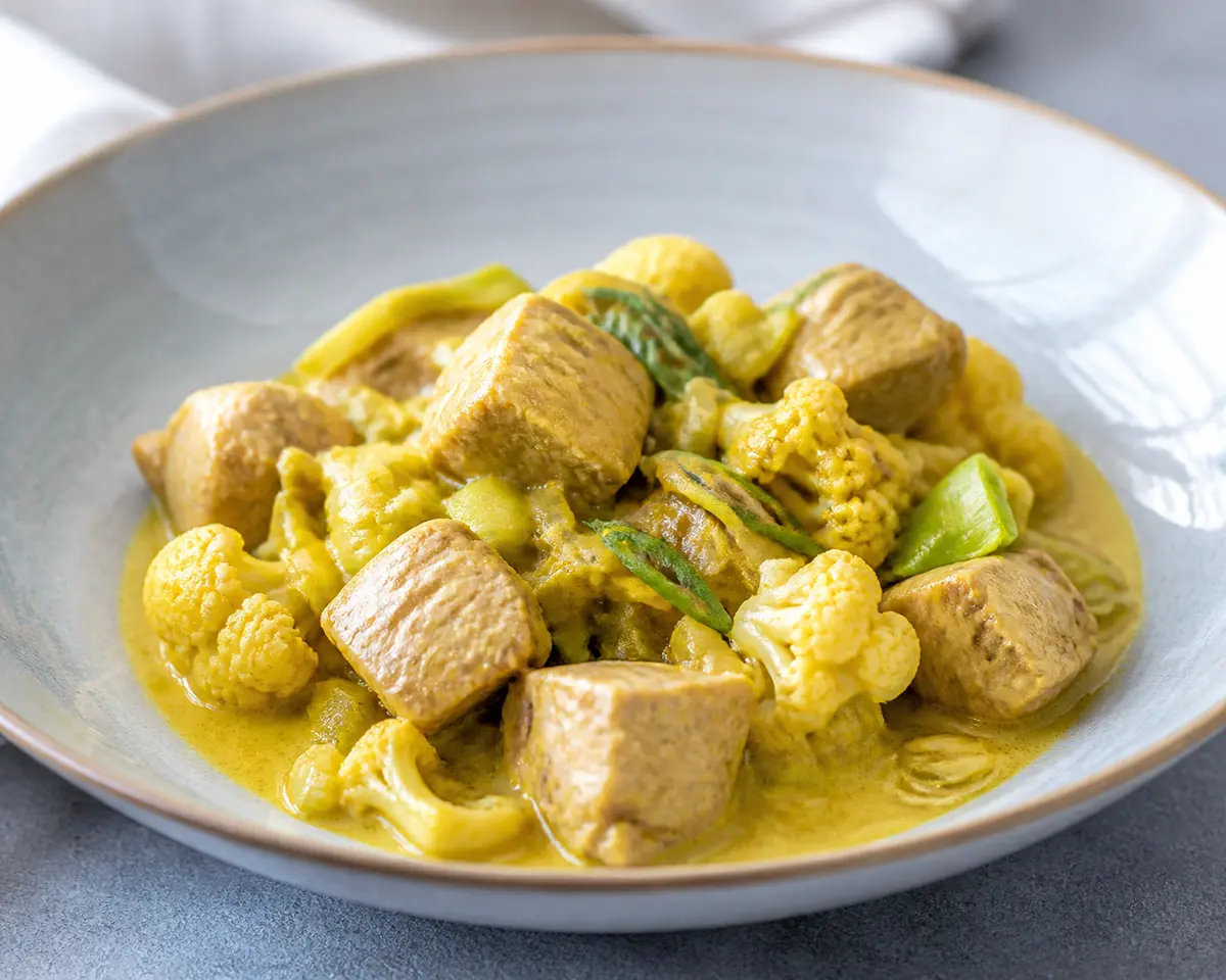 Slow Cooker Pork with Cauliflower, Leek, and Gentle Coconut Turmeric Lime Sauce